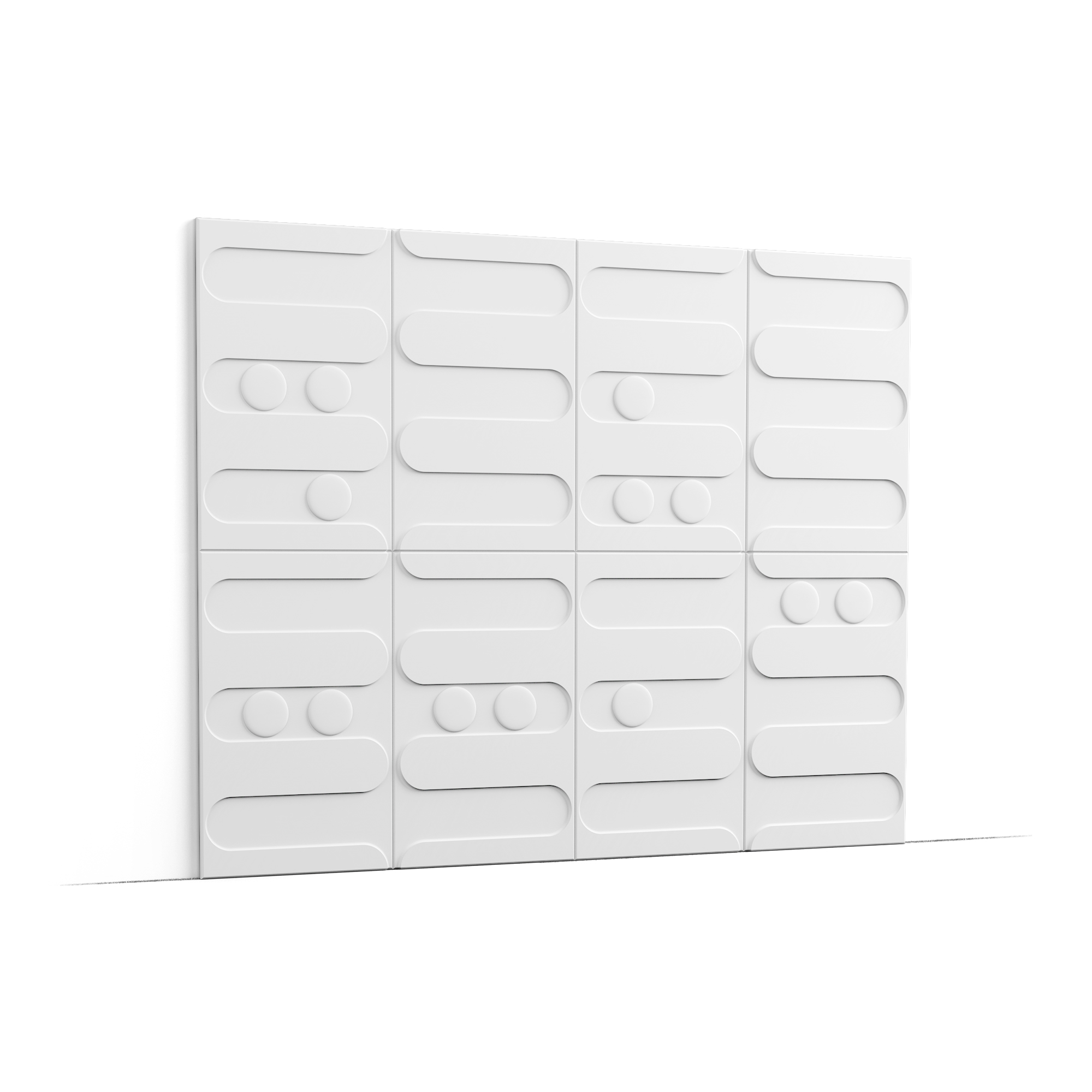 White modular wall panels with rounded rectangular indentations and circular knobs forming a geometric pattern from a low angle